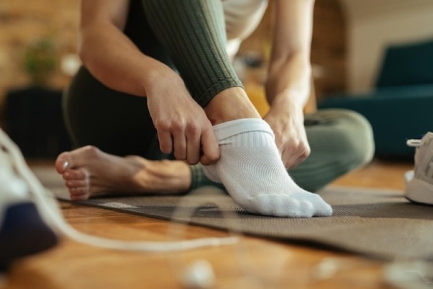 Is it better to wash socks by themselves or with other clothes?